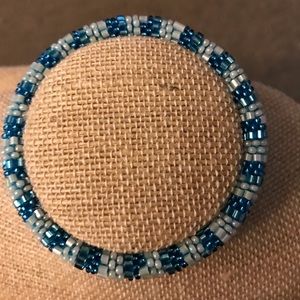 Blue beaded infinity bracelet